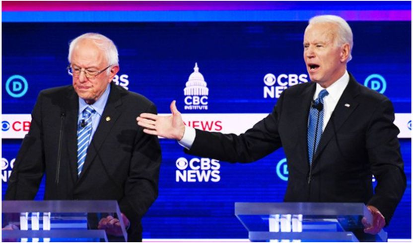 Ish Nënkryetari Joe Biden dhe Sen. Bernie Sanders gjatë një debati. (AFP)